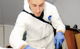Image of a man in pest exterminator gear